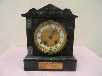 Victorian slate clock movement is mechanical 8 day strikes the hours. Quality