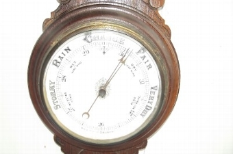 Antique Barometer anoroid oak cased large sized early 20th century mercury thermometer.