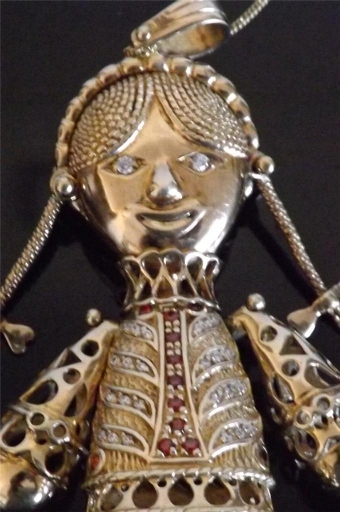 Antique Beautiful rag doll pendant in solid silver gold plated all moving parts rare