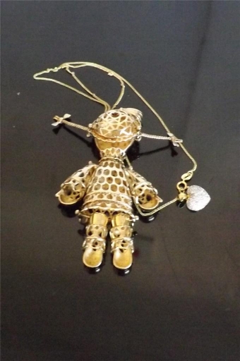 Antique Beautiful rag doll pendant in solid silver gold plated all moving parts rare