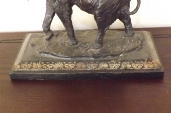 Antique Bronze African bull Elephant in charging pose.