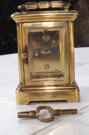 Antique Carriage Clock in minature quality item in working condition. CB
