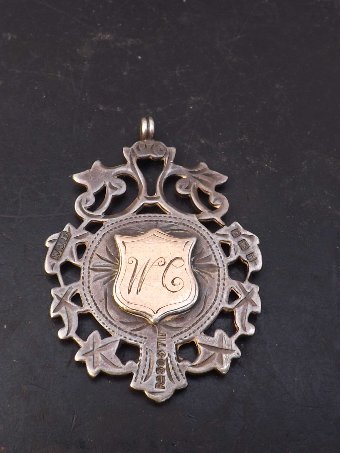 Antique Silver and gold watch chains fob dated 1910. CC