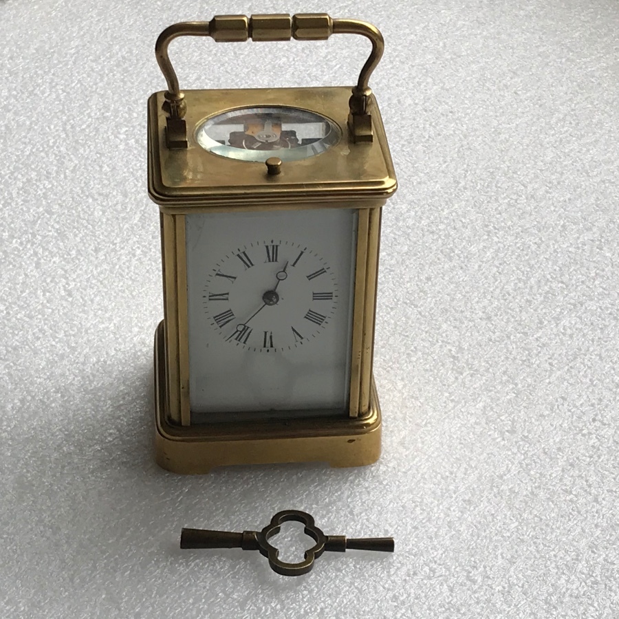 Antique Carriage clock repeater on a gong 