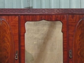 Antique Antique Edwardian Flamed Mahogany Triple Wardrobe by Maples & Co w7512/29.7