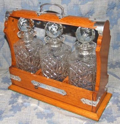 Antique Antique EDWARDIAN Oak 3 Decanter / Bottle TANTALUS with Silver Plated Mounts