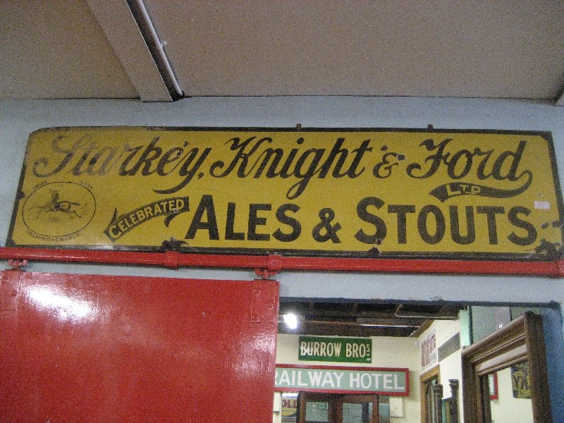Starkey, Knight & Ford Enamel Sign