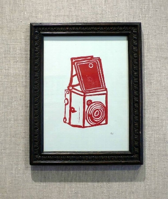Red Camera in Vintage Frame