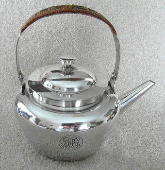 A Silver Plated Tea Pot by Dr Christopher Dresser Hukin & Heath