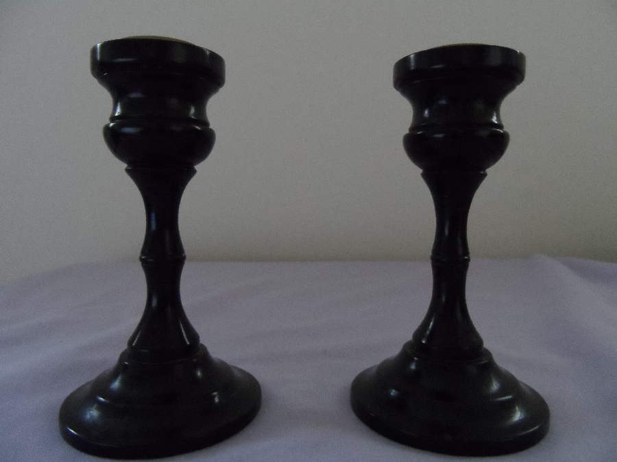 Pair of victorian/edwardian ebony candlesticks 