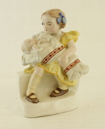 GIRL FIGURINE WITH BABY