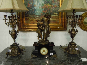 Antique French Romantic Mantle clock on marble base with figure