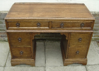 An Oak Six Drawer Desk