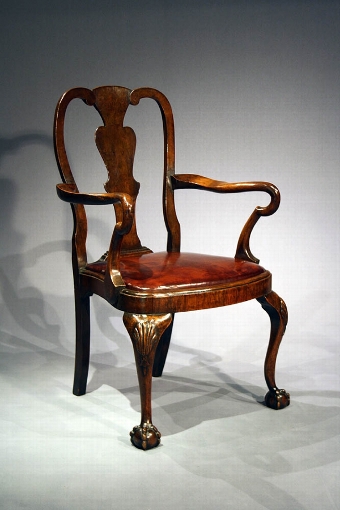 Antique Antique Edwardian walnut ball and claw armchair