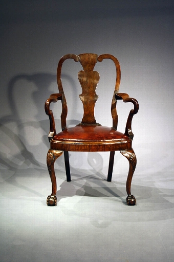 Antique Antique Edwardian walnut ball and claw armchair