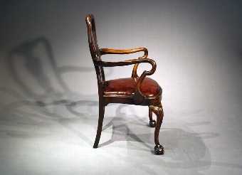 Antique Antique Edwardian walnut ball and claw armchair