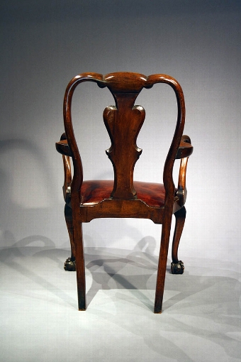 Antique Antique Edwardian walnut ball and claw armchair