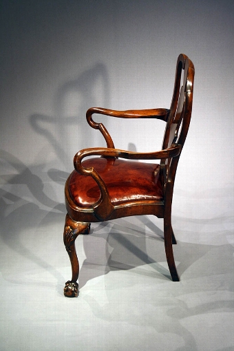 Antique Antique Edwardian walnut ball and claw armchair