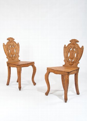 A pair of Victorian Oak Hall Chairs