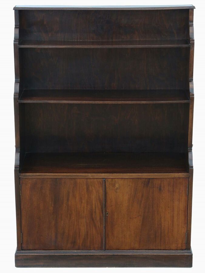 Antique quality C1920 mahogany campaign waterfall bookcase