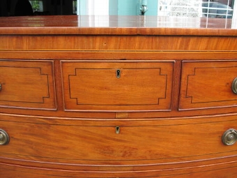 Antique A REGENCY INLAID BOWFRONTED CHEST OF DRAWERS