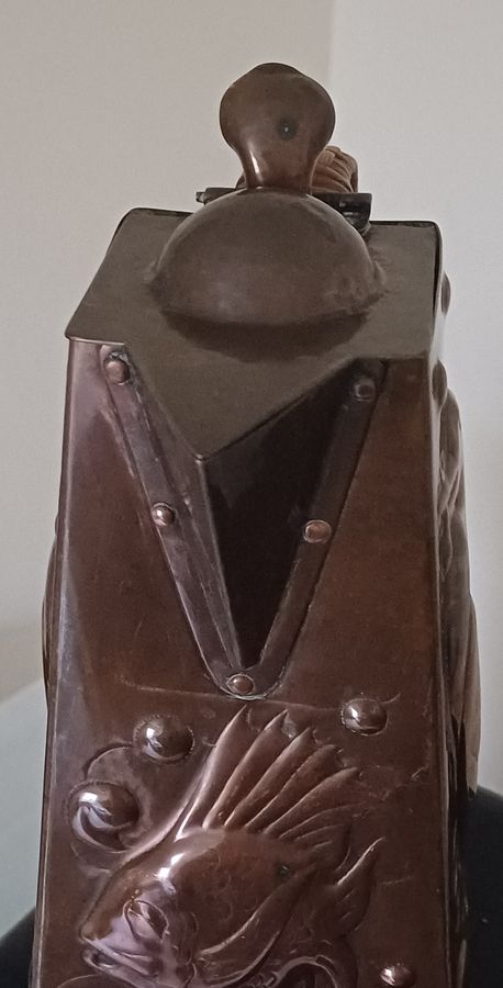 Antique A Newlyn copper Cormorant and John Dory decorated hot water jug, dating circa 1905