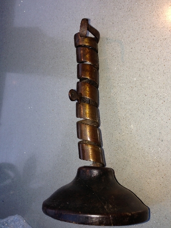 An antique spiral candlestick