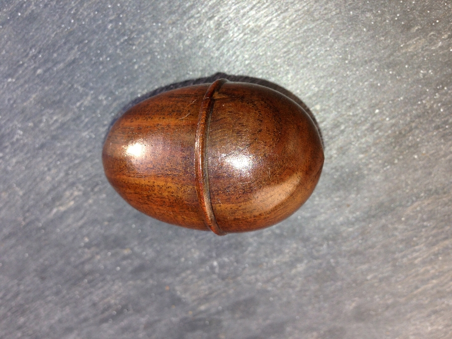 A early 19th century treen pocket nutmeg grater in the shape of an egg