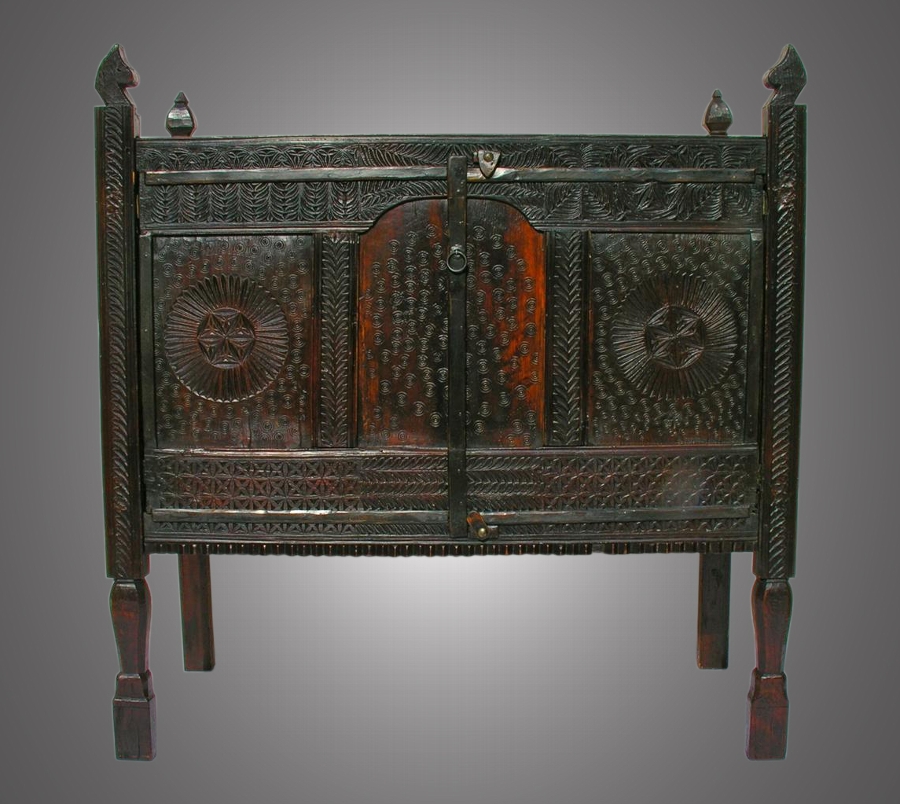 A large Anglo-Indian teak dowry cabinet