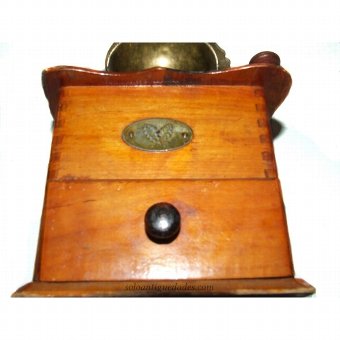 Antique Manual coffee grinder. Metal and wood
