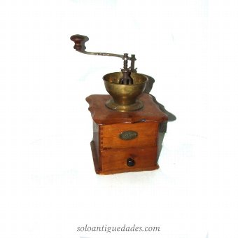 Antique Manual coffee grinder. Metal and wood