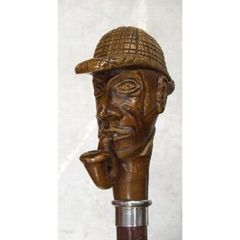 Staff decorated pipe man head