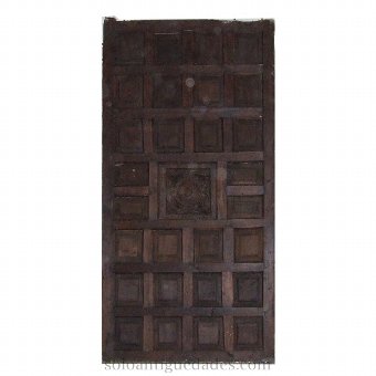 Door with embossed floral decoration