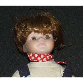 Antique Plastic doll with bib
