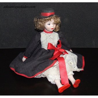Antique Doll with beautiful black dress