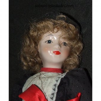 Antique Doll with beautiful black dress