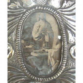 Antique Silver sculpture representing a cross