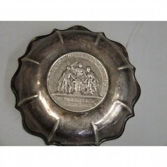 Metal tray with medal