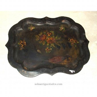 Antique Tray with floral motifs on black background