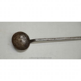Antique Bucket handle decorated by semicircles