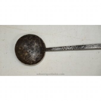 Antique Ladle for serving food with geometric engravings