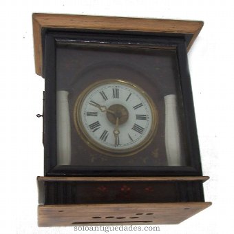 Black Forest Clock type with fluted columns.