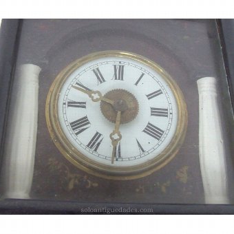 Antique Black Forest Clock type with fluted columns.