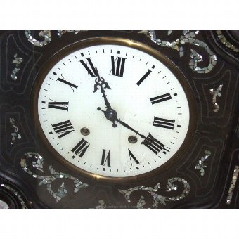 Antique Clock Ox-eye type. With bell and porcelain sphere