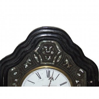 Antique Clock Ox-eye type. Wooden frame with pearl