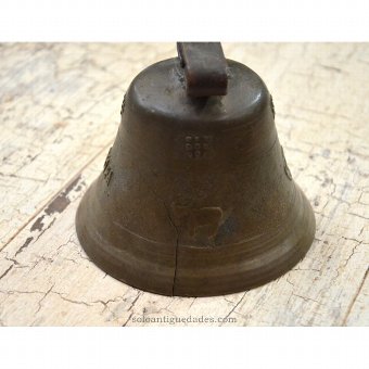 Antique Bell decorated with reliefs (cross and cow)