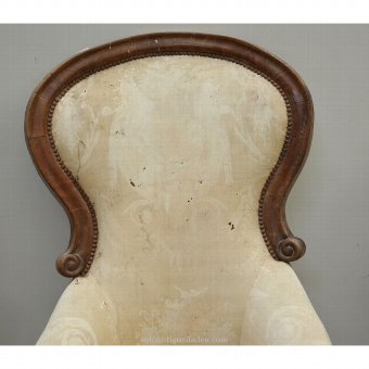 Antique Elizabethan chair upholstered in beige