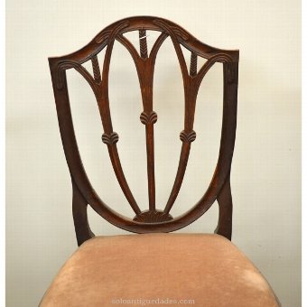 Antique Feather chair upholstered in beige wood