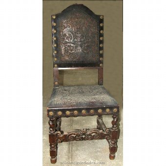 Wood and leather chair embossed
