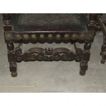 Antique Wooden armchair with leather decoration
